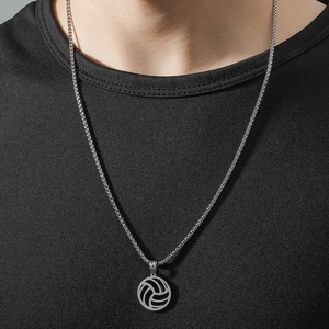 Polished hollow basketball pendant necklace in stainless steel on a male model