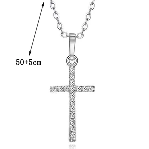 Detail view of rhinestone-encrusted cross pendant necklace with 50+5cm chain length