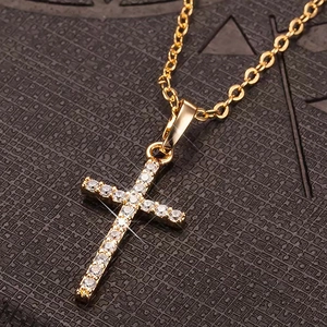Elegant gold cross necklace for men and women featuring sparkling pavé set crystals