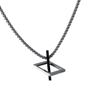 Detail of a minimalist geometric pendant with silver rectangular frame and black vertical line