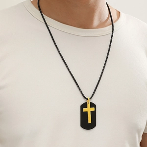 Men's black stainless steel dog tag necklace with a gold cross on a black bead chain
