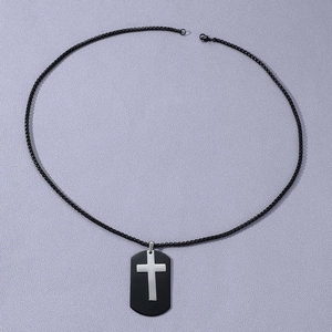 Men's matte black dog tag necklace with silver cross pendant on woven metal chain