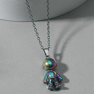 Iridescent astronaut pendant necklace with a minimalist silver stainless steel chain