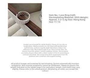 Detailed macro view of an S925 sterling silver lace cutout ring with plated finish details