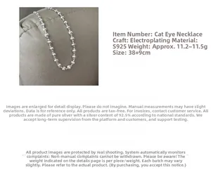Detail of S925 sterling silver necklace showing cat eye bead and adjustable chain length
