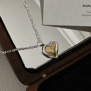 Minimalist 925 silver heart necklace with gold matte inlay on wooden jewelry box