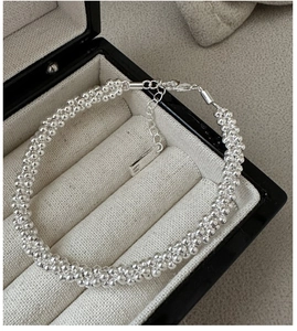 Detail of S925 sterling silver beaded bracelet with lobster clasp and extension chain