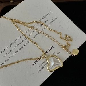 Vintage French 925 silver heart necklace with gold contrast and matte finish for women