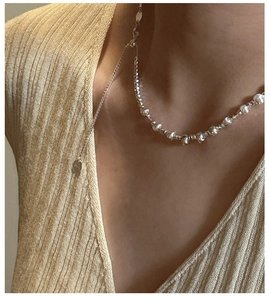 Close-up of S925 sterling silver cat-eye bead necklace with adjustable slider chain