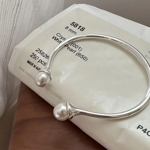 Minimalist S925 sterling silver open bangle featuring two white 8mm round pearls