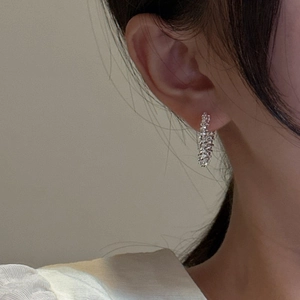 Minimalist S925 sterling silver hoop earrings with a sparkling textured lava finish