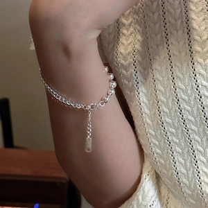 Elegant S925 sterling silver beaded bracelet with lobster clasp worn on a female wrist