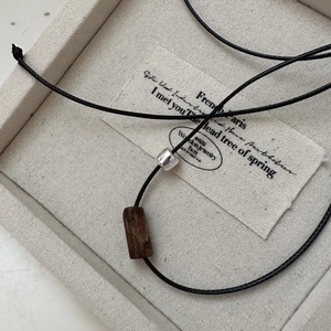 Minimalist S925 sterling silver and wood cylinder pendant on black wax cord necklace
