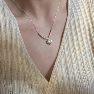 Classic S925 sterling silver heart necklace with laser beads on a delicate chain