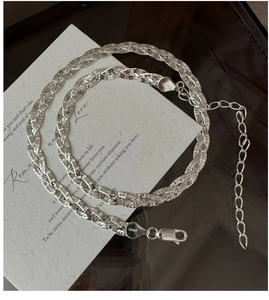Close-up of S925 sterling silver triple braided chain with lobster clasp and 925 engraving