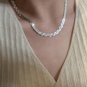 Three-layer braided S925 sterling silver chain necklace worn on a V-neck sweater