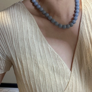Minimalist S925 silver blue round bead necklace shown on a model neck with a V-neck top