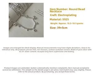 Detail of S925 sterling silver beaded necklace with alternating sizes and extension chain