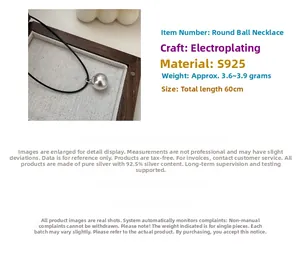 Detailed view of S925 sterling silver ball pendant on a 60cm long black cord necklace