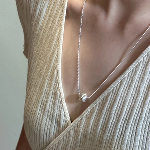 S925 sterling silver ball pendant necklace with refined bead chain on model