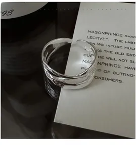 Macro shot of S925 sterling silver stamp on the inner band of the minimalist cross ring