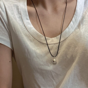 Minimalist S925 sterling silver frosted bead pendant with a sleek black cord necklace