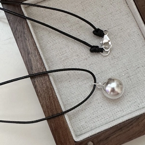Minimalist S925 silver matte ball pendant on black cord necklace with mirror finish