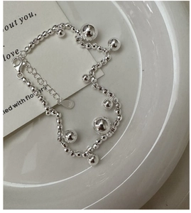 Detail of S925 sterling silver beaded bracelet with lobster clasp and extension chain