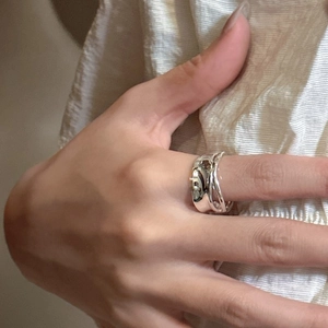 Minimalist S925 sterling silver double layered pleated ring shown on model hand