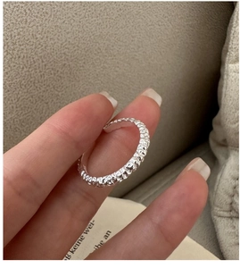 Detail showing hand-hammered texture of S925 sterling silver minimalist open ring