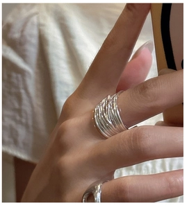 Close-up of S925 sterling silver multi-layer wrap ring showing elegant polished finish