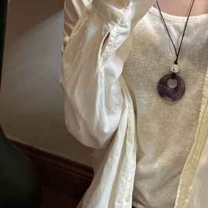 Minimalist S925 silver necklace with purple natural stone pendant on black woven cord