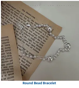 Detail of multi-layered S925 sterling silver beaded bracelet with AG925 hallmark stamp