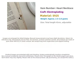 Close-up of S925 sterling silver heart necklace with adjustable chain and pendant