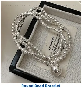 Detailed view of S925 sterling silver triple-layer beaded bracelet with a large ball pendant