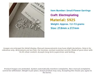 Gros plan sur boucles d'oreilles fleur S925 argent avec design ajouré et dimensions
