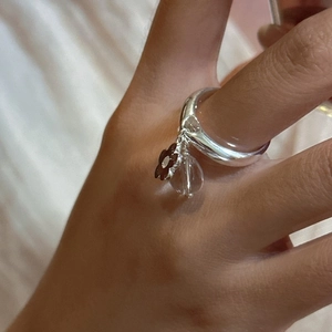 S925 sterling silver ring featuring a brown flower charm and crystal water drop bead