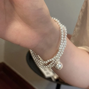 Minimalist S925 sterling silver triple layer beaded bracelet with a smooth ball pendant