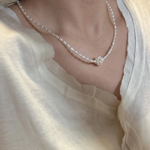S925 sterling silver necklace featuring delicate freshwater pearls and a floral cluster pendant
