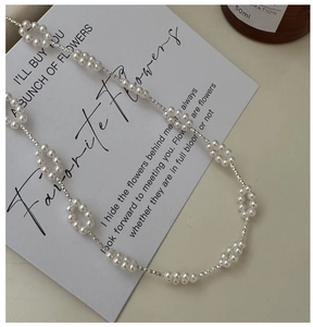 Detailaufnahme der S925 Sterlingsilber Kette mit gewebtem Ring und kleinen Perlen