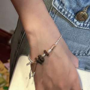 Handmade S925 sterling silver beaded bracelet featuring natural dark brown stones