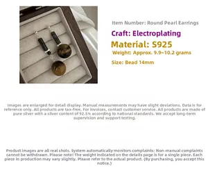 Detail of S925 sterling silver earrings featuring 14mm tiger eye stone beads and plating