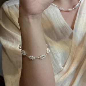 Elegant S925 sterling silver pearl flower necklace and bracelet set on model