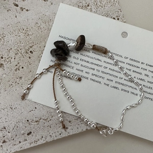 S925 sterling silver beaded bracelet featuring natural stones and brown braided wax cord