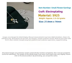 Macro view of S925 sterling silver flower earrings showing dimensions 21.4mm by 14mm