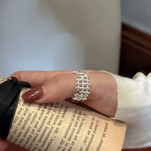 Minimalist S925 sterling silver woven ring with a textured interlaced design for women