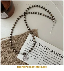 Vintage S925 silver coin pendant necklace with brown beads and heart logo charm