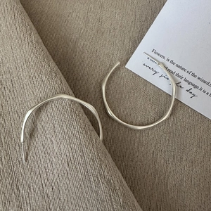 Minimalist S925 sterling silver matte large hoop earrings with irregular wavy design