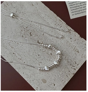 Detailed close-up of S925 sterling silver snake chain showing the adjustable slider clasp