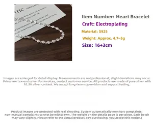 Detailed view of the S925 sterling silver heart bracelet with adjustable chain link